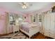 Charming bedroom with white bed frame and rug at 128 Tildenville School Rd, Winter Garden, FL 34787