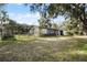 Ranch home with large front yard and mature trees at 128 Tildenville School Rd, Winter Garden, FL 34787