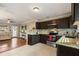 Open concept kitchen with granite countertops at 128 Tildenville School Rd, Winter Garden, FL 34787