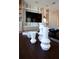 Stylish coffee table with decorative vases and bowls at 13586 Abberwick Dr, Orlando, FL 32832