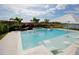 Resort-style pool with spa, lounge chairs, and hammock at 13586 Abberwick Dr, Orlando, FL 32832