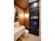 Modern powder room with floating vanity and a sleek design at 13586 Abberwick Dr, Orlando, FL 32832