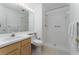 Clean bathroom with shower, toilet and light wood vanity at 13917 Timberland Dr # 201, Orlando, FL 32824