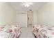 Spacious bedroom with two beds and ample closet space at 13917 Timberland Dr # 201, Orlando, FL 32824