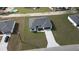 New construction home featuring a spacious front yard and long driveway at 15122 Sw 61St Court Rd, Ocala, FL 34473
