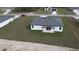 View of the backyard with a pergola, and lots of green space at 15122 Sw 61St Court Rd, Ocala, FL 34473