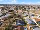 Aerial perspective of the house and neighborhood at 16143 Palmetto Hill St, Clermont, FL 34714