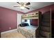 Bedroom with a bunk bed and gray dresser at 16143 Palmetto Hill St, Clermont, FL 34714