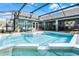 Refreshing pool with a spacious screened enclosure at 16143 Palmetto Hill St, Clermont, FL 34714