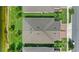 Directly above is a gray roof with red brick driveway and green grass at 17597 Summersweet Way, Clermont, FL 34714