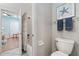 Small bathroom with tub shower combo and toilet at 176 Nandina Ter, Winter Springs, FL 32708