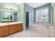 Bright bathroom with double vanity and garden tub at 176 Nandina Ter, Winter Springs, FL 32708