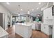 Spacious kitchen with island, stainless steel appliances, and white cabinetry at 176 Nandina Ter, Winter Springs, FL 32708