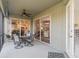 This screened patio boasts views of the kitchen and living room at 176 Nandina Ter, Winter Springs, FL 32708