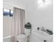 Simple bathroom with white pedestal sink and bathtub at 1934 Abbington St # 37, Apopka, FL 32712