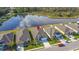 Aerial view of a house and neighborhood with pond at 2022 Canton Park Dr, Winter Haven, FL 33881