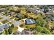 Aerial view of a house on a quiet street near a lake at 217 Pleasant Valley Dr, Daytona Beach, FL 32114