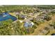 Aerial view of a house near a lake in a community at 217 Pleasant Valley Dr, Daytona Beach, FL 32114