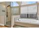 Spa-like bathroom with a large shower and soaking tub at 217 Pleasant Valley Dr, Daytona Beach, FL 32114