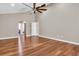 Hardwood floor bedroom with access to bathroom and closet at 217 Pleasant Valley Dr, Daytona Beach, FL 32114