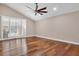 Hardwood floors and plantation shutters in this spacious bedroom at 217 Pleasant Valley Dr, Daytona Beach, FL 32114