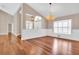 Bright dining room with hardwood floors and views to the entryway at 217 Pleasant Valley Dr, Daytona Beach, FL 32114