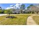 House exterior showcasing a circular driveway at 217 Pleasant Valley Dr, Daytona Beach, FL 32114