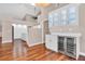 Kitchen with white cabinets, wine cooler and hardwood floors at 217 Pleasant Valley Dr, Daytona Beach, FL 32114