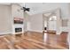 Living room with hardwood floors, fireplace, and view of entryway at 217 Pleasant Valley Dr, Daytona Beach, FL 32114