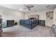 Main bedroom with plush bed and gray nightstands at 220 Foxtail Loop, Davenport, FL 33837