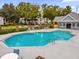 Inviting community pool with ample deck space at 2201 Coach House Blvd # 1, Orlando, FL 32812