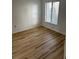 Bright bedroom with light wood laminate flooring at 2210 Stonington Ave # 2210, Orlando, FL 32817