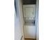 Stacked washer and dryer in a closet at 2210 Stonington Ave # 2210, Orlando, FL 32817