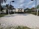 Enjoy community amenities with this sand volleyball court, complete with lighting and nearby seating at 2407 Silver Palm Dr, Kissimmee, FL 34747