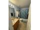 Second full bathroom with tub/shower, vanity and storage at 241 Shady Ln, Deland, FL 32724