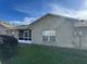 House exterior view, showcasing a screened porch at 241 Shady Ln, Deland, FL 32724