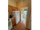 Convenient laundry room with washer and dryer hookups, just off the kitchen at 241 Shady Ln, Deland, FL 32724