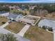 Aerial view showcasing house, yard, and neighborhood at 2752 Sedgefield Ave, Deltona, FL 32725