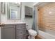 Updated bathroom with gray vanity, marble countertop, and shower/tub combo at 2752 Sedgefield Ave, Deltona, FL 32725