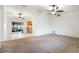 Spacious living room with tile and carpet flooring, and ceiling fans at 2752 Sedgefield Ave, Deltona, FL 32725