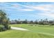 Scenic golf course view with lush green fairways at 303 Foxhill Ct, Debary, FL 32713