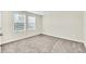 Comfortable bedroom with neutral walls and carpet at 3138 Dark Sky Dr, Harmony, FL 34773