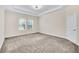 Spacious bedroom with plush carpeting and neutral color palette at 3138 Dark Sky Dr, Harmony, FL 34773