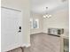 Formal dining room with hardwood floors and chandelier at 3138 Dark Sky Dr, Harmony, FL 34773