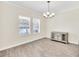 Bright dining room features hardwood floors, a chandelier, and built-in cabinetry at 3138 Dark Sky Dr, Harmony, FL 34773