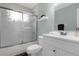 Clean bathroom with white vanity, shower/tub combo, and updated fixtures at 3163 Britannia Blvd # D, Kissimmee, FL 34747