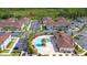 Community aerial view showcasing the resort-style pool and townhomes at 3201 Gold Ln, Kissimmee, FL 34747