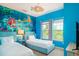 The Little Mermaid themed bedroom with twin beds at 3201 Gold Ln, Kissimmee, FL 34747