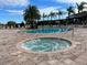 Relaxing community pool and spa with plenty of lounge chairs at 3201 Gold Ln, Kissimmee, FL 34747