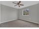 Bedroom with ceiling fan and window at 370 Aldershot Ct, Kissimmee, FL 34758